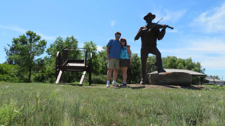 Metis Fiddler and Ox Cart - Davidson, SK.